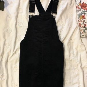 black overall dress